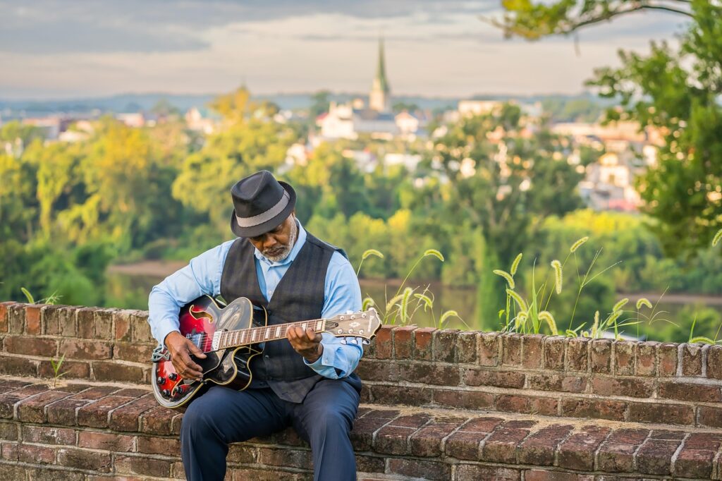 Home man, music, guitar, senior, countryside, portrait